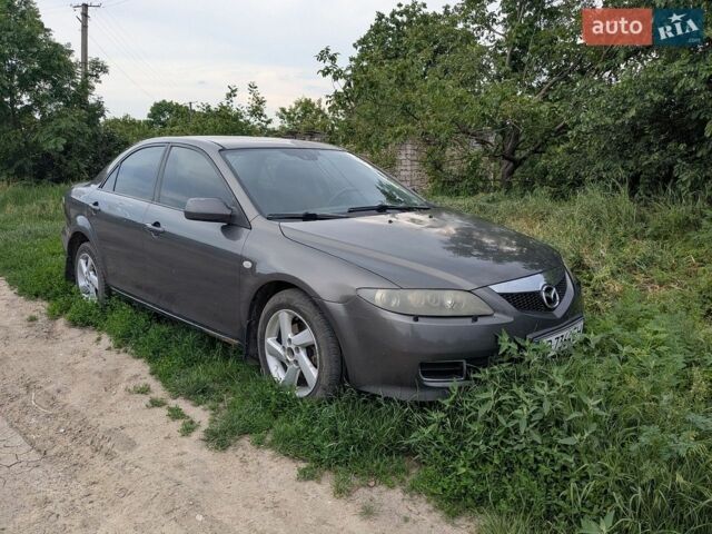 Серый Мазда 6, объемом двигателя 2 л и пробегом 290 тыс. км за 3200 $, фото 1 на Automoto.ua