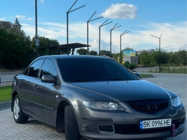 Сірий Мазда 6, об'ємом двигуна 2 л та пробігом 320 тис. км за 4879 $, фото 1 на Automoto.ua