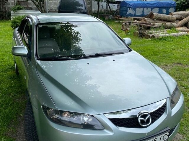 Серый Мазда 6, объемом двигателя 2 л и пробегом 289 тыс. км за 4650 $, фото 1 на Automoto.ua