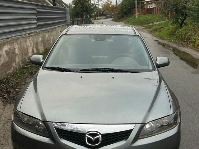 Серый Мазда 6, объемом двигателя 2 л и пробегом 198 тыс. км за 6100 $, фото 1 на Automoto.ua