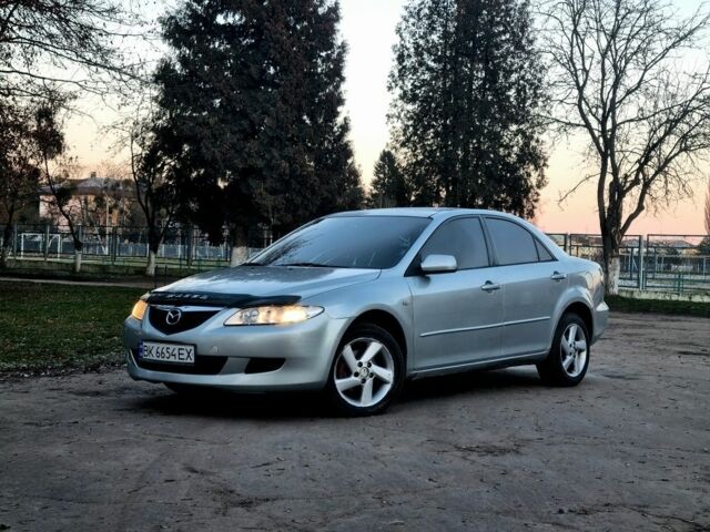 Серый Мазда 6, объемом двигателя 2 л и пробегом 400 тыс. км за 2900 $, фото 1 на Automoto.ua
