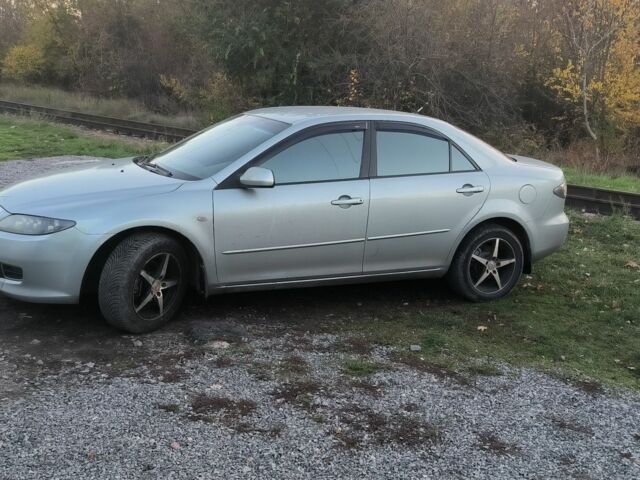 Сірий Мазда 6, об'ємом двигуна 1.8 л та пробігом 240 тис. км за 4500 $, фото 1 на Automoto.ua