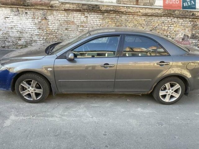 Серый Мазда 6, объемом двигателя 1.8 л и пробегом 225 тыс. км за 4300 $, фото 1 на Automoto.ua