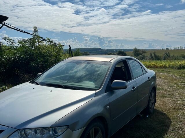 Серый Мазда 6, объемом двигателя 2 л и пробегом 300 тыс. км за 1799 $, фото 1 на Automoto.ua