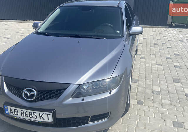Серый Мазда 6, объемом двигателя 2 л и пробегом 182 тыс. км за 4600 $, фото 1 на Automoto.ua