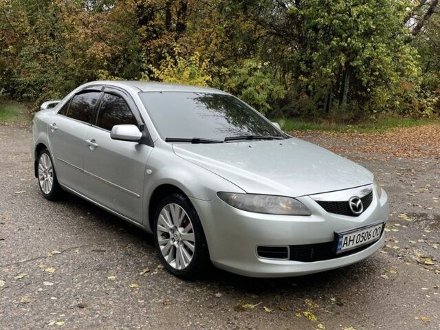 Серый Мазда 6, объемом двигателя 2 л и пробегом 245 тыс. км за 5700 $, фото 1 на Automoto.ua