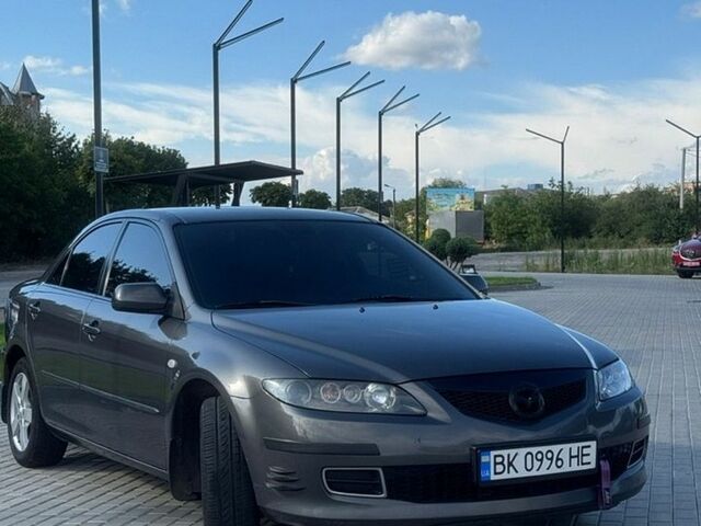 Серый Мазда 6, объемом двигателя 2 л и пробегом 323 тыс. км за 5000 $, фото 1 на Automoto.ua