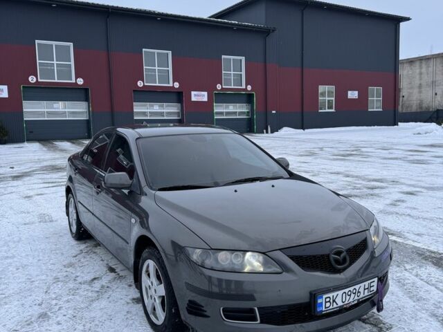 Серый Мазда 6, объемом двигателя 2 л и пробегом 318 тыс. км за 5500 $, фото 1 на Automoto.ua
