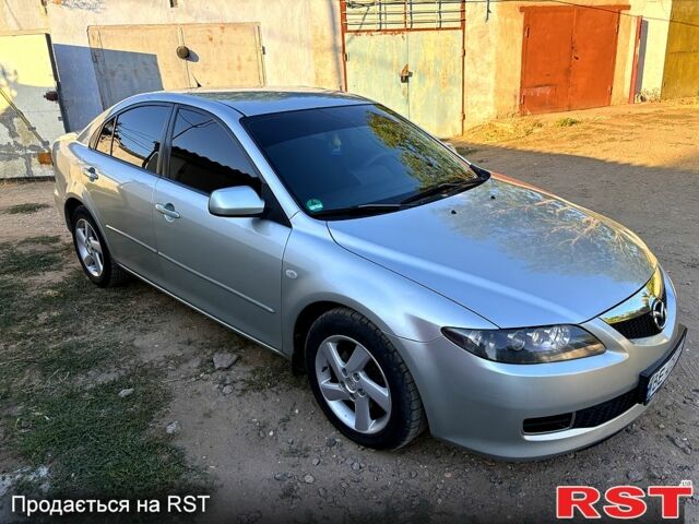 Серый Мазда 6, объемом двигателя 2 л и пробегом 247 тыс. км за 4100 $, фото 1 на Automoto.ua