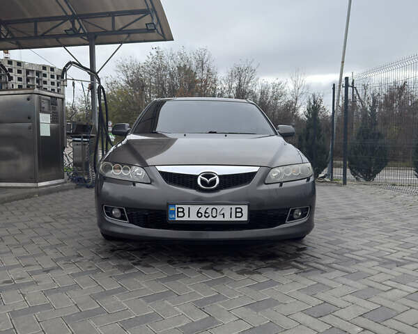 Серый Мазда 6, объемом двигателя 2 л и пробегом 160 тыс. км за 5200 $, фото 1 на Automoto.ua