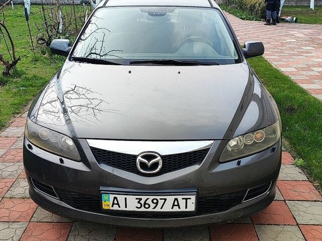 Серый Мазда 6, объемом двигателя 2 л и пробегом 347 тыс. км за 2700 $, фото 1 на Automoto.ua