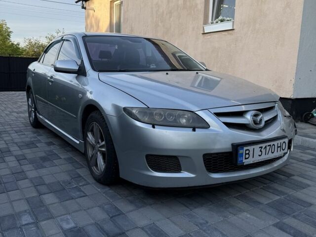 Серый Мазда 6, объемом двигателя 2.3 л и пробегом 207 тыс. км за 3100 $, фото 1 на Automoto.ua