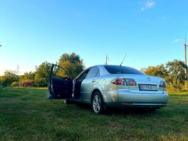 Серый Мазда 6, объемом двигателя 2 л и пробегом 343 тыс. км за 6200 $, фото 1 на Automoto.ua