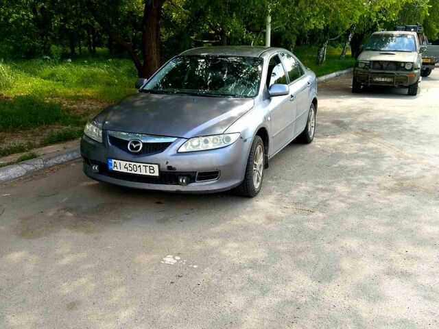 Серый Мазда 6, объемом двигателя 2 л и пробегом 300 тыс. км за 3700 $, фото 1 на Automoto.ua