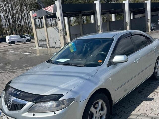 Серый Мазда 6, объемом двигателя 2 л и пробегом 245 тыс. км за 4300 $, фото 1 на Automoto.ua