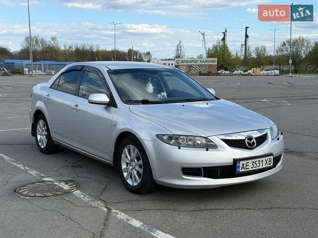 Серый Мазда 6, объемом двигателя 2 л и пробегом 265 тыс. км за 5700 $, фото 1 на Automoto.ua