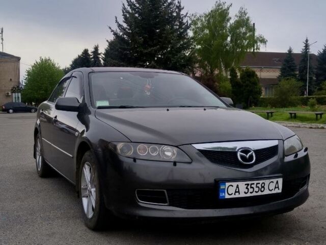 Серый Мазда 6, объемом двигателя 2 л и пробегом 195 тыс. км за 5800 $, фото 1 на Automoto.ua