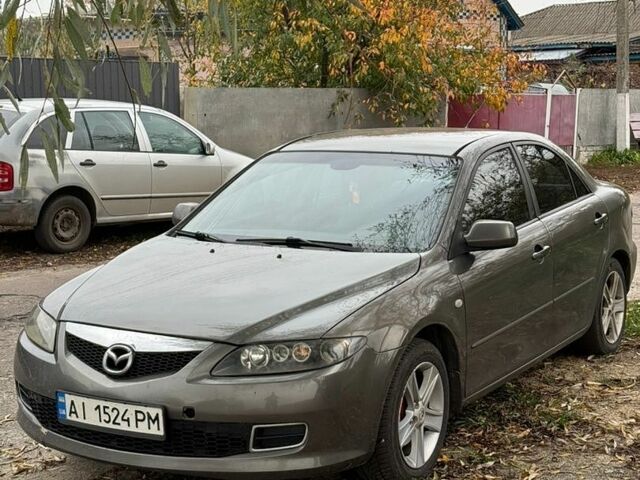Сірий Мазда 6, об'ємом двигуна 2 л та пробігом 377 тис. км за 3599 $, фото 1 на Automoto.ua