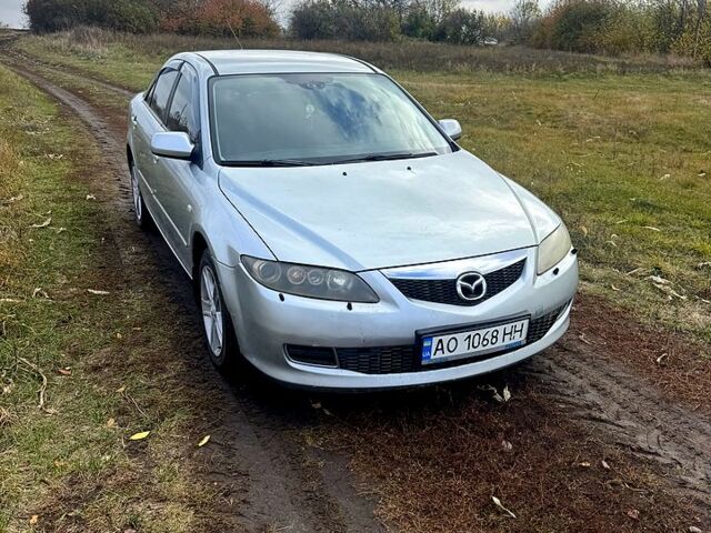 Серый Мазда 6, объемом двигателя 2 л и пробегом 208 тыс. км за 4200 $, фото 1 на Automoto.ua