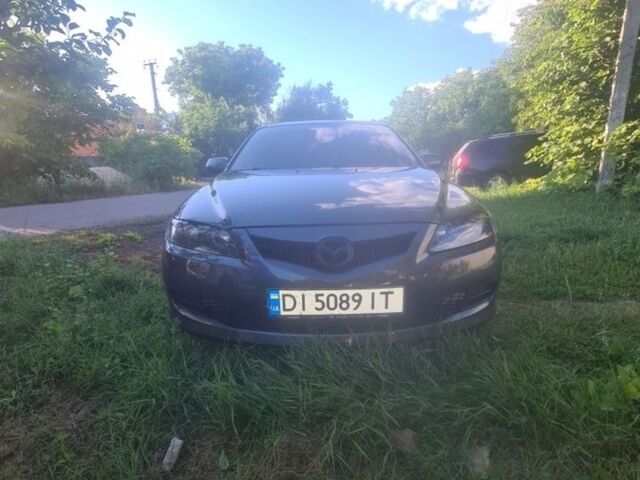 Серый Мазда 6, объемом двигателя 2 л и пробегом 274 тыс. км за 6035 $, фото 1 на Automoto.ua