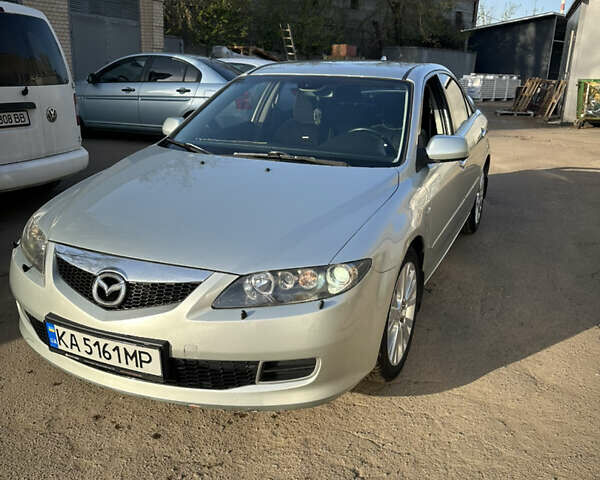Серый Мазда 6, объемом двигателя 2 л и пробегом 244 тыс. км за 4600 $, фото 1 на Automoto.ua
