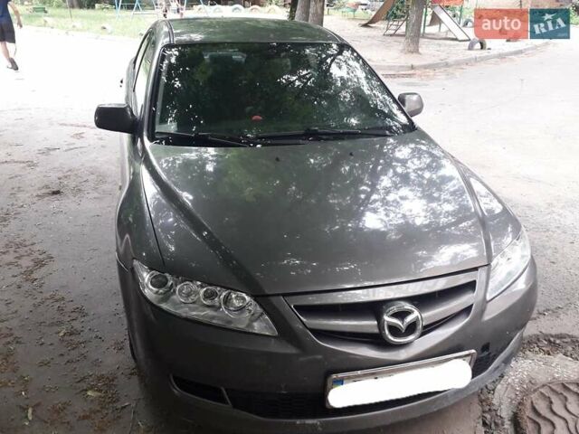 Серый Мазда 6, объемом двигателя 2 л и пробегом 275 тыс. км за 4200 $, фото 1 на Automoto.ua