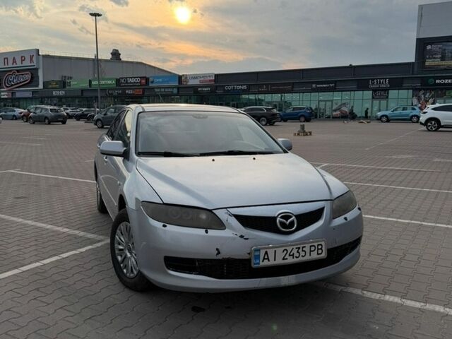 Серый Мазда 6, объемом двигателя 2 л и пробегом 383 тыс. км за 3900 $, фото 1 на Automoto.ua
