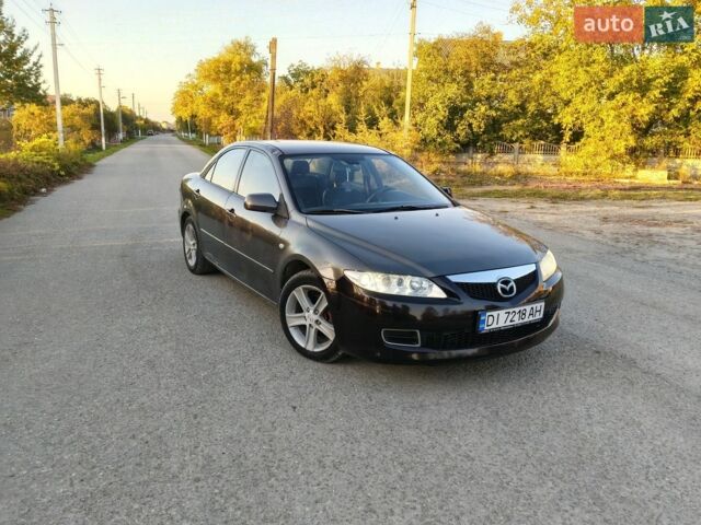 Серый Мазда 6, объемом двигателя 1.8 л и пробегом 233 тыс. км за 2899 $, фото 1 на Automoto.ua