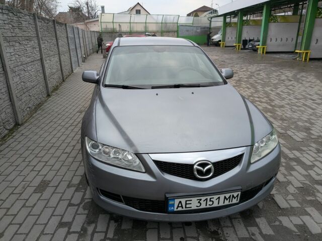 Серый Мазда 6, объемом двигателя 2 л и пробегом 257 тыс. км за 4486 $, фото 1 на Automoto.ua