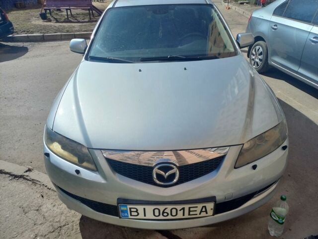Серый Мазда 6, объемом двигателя 2 л и пробегом 148 тыс. км за 5000 $, фото 1 на Automoto.ua