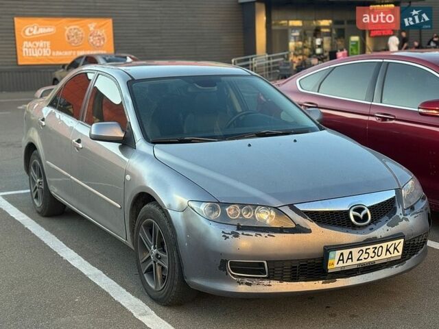 Серый Мазда 6, объемом двигателя 2 л и пробегом 293 тыс. км за 2850 $, фото 1 на Automoto.ua