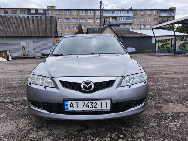 Серый Мазда 6, объемом двигателя 2 л и пробегом 380 тыс. км за 3900 $, фото 1 на Automoto.ua