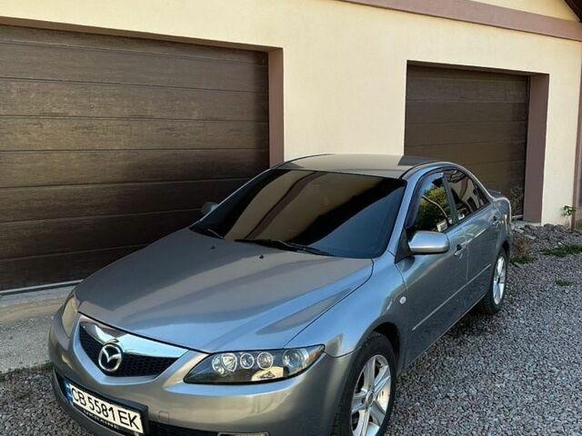 Серый Мазда 6, объемом двигателя 2 л и пробегом 332 тыс. км за 4750 $, фото 1 на Automoto.ua