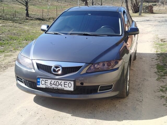 Сірий Мазда 6, об'ємом двигуна 2 л та пробігом 244 тис. км за 4100 $, фото 1 на Automoto.ua