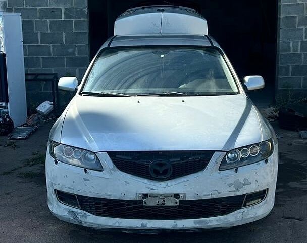 Серый Мазда 6, объемом двигателя 2 л и пробегом 380 тыс. км за 2650 $, фото 1 на Automoto.ua