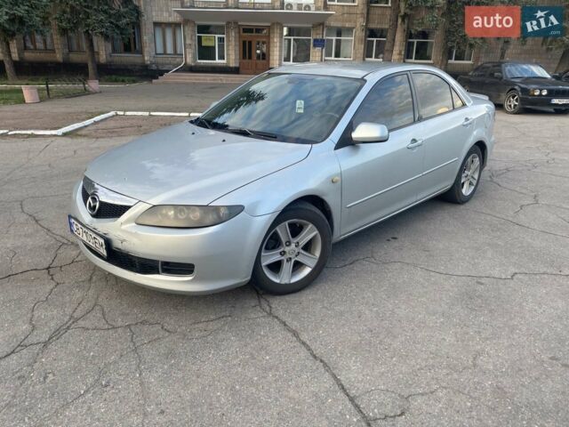 Серый Мазда 6, объемом двигателя 2 л и пробегом 295 тыс. км за 4500 $, фото 1 на Automoto.ua