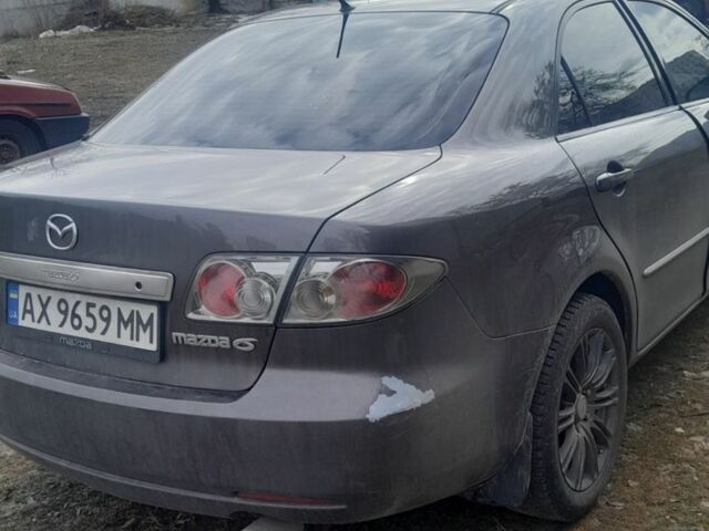 Серый Мазда 6, объемом двигателя 1.8 л и пробегом 290 тыс. км за 5200 $, фото 1 на Automoto.ua