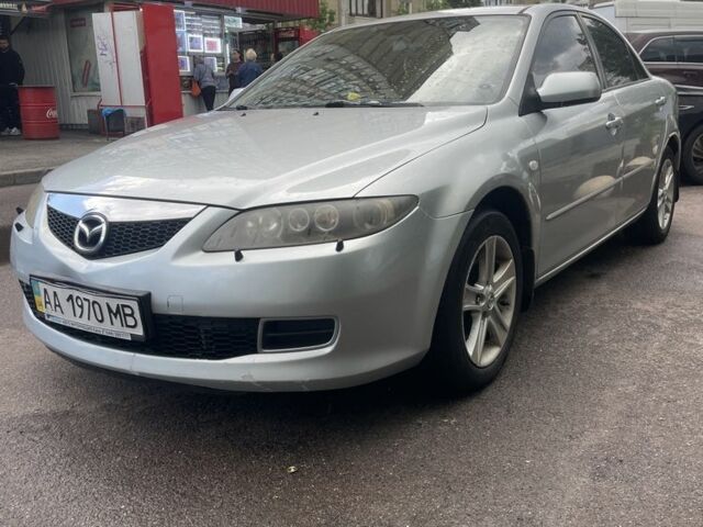 Серый Мазда 6, объемом двигателя 2 л и пробегом 240 тыс. км за 4000 $, фото 1 на Automoto.ua