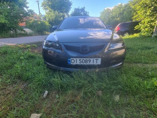 Серый Мазда 6, объемом двигателя 2 л и пробегом 274 тыс. км за 6035 $, фото 1 на Automoto.ua