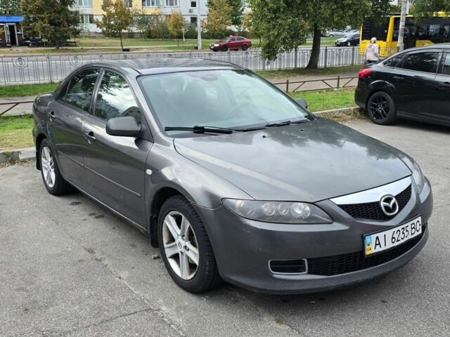 Серый Мазда 6, объемом двигателя 1.8 л и пробегом 384 тыс. км за 3900 $, фото 1 на Automoto.ua