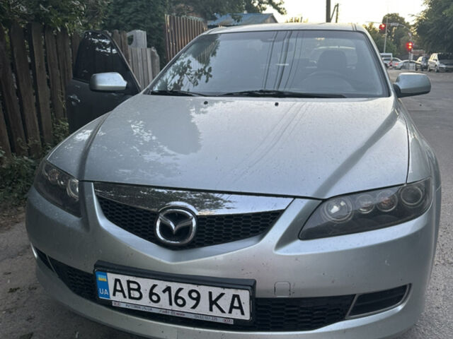 Серый Мазда 6, объемом двигателя 1.8 л и пробегом 235 тыс. км за 4400 $, фото 1 на Automoto.ua