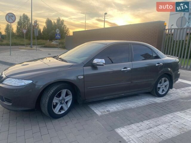 Серый Мазда 6, объемом двигателя 2 л и пробегом 358 тыс. км за 3900 $, фото 1 на Automoto.ua