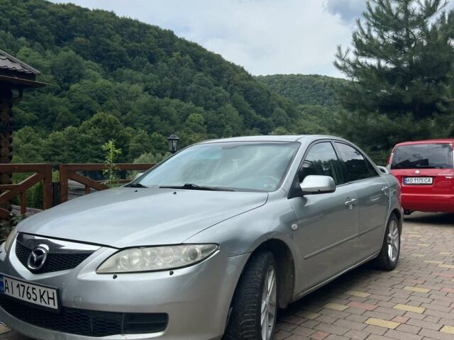 Серый Мазда 6, объемом двигателя 2 л и пробегом 253 тыс. км за 4750 $, фото 1 на Automoto.ua