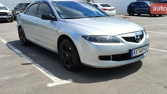 Серый Мазда 6, объемом двигателя 2 л и пробегом 205 тыс. км за 6400 $, фото 1 на Automoto.ua