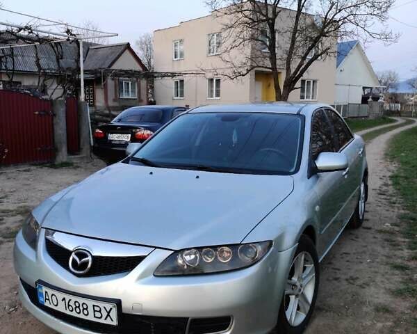Серый Мазда 6, объемом двигателя 1.8 л и пробегом 200 тыс. км за 5000 $, фото 1 на Automoto.ua