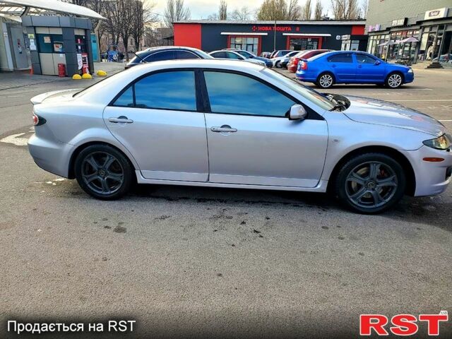 Серый Мазда 6, объемом двигателя 2.3 л и пробегом 250 тыс. км за 5800 $, фото 1 на Automoto.ua