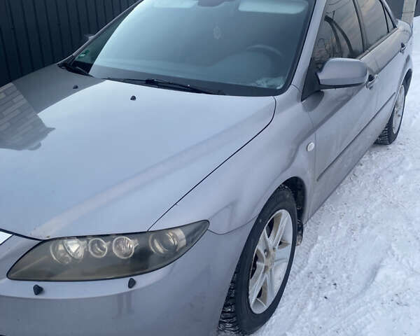 Серый Мазда 6, объемом двигателя 2 л и пробегом 300 тыс. км за 4250 $, фото 1 на Automoto.ua