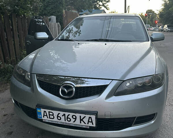 Серый Мазда 6, объемом двигателя 1.8 л и пробегом 235 тыс. км за 4400 $, фото 1 на Automoto.ua
