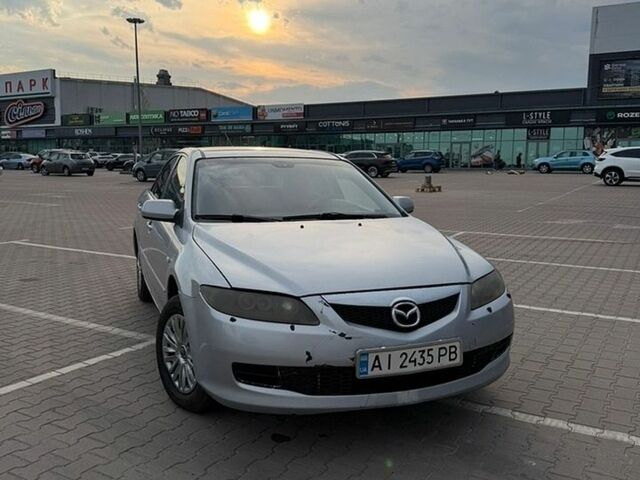 Серый Мазда 6, объемом двигателя 2 л и пробегом 383 тыс. км за 3900 $, фото 1 на Automoto.ua