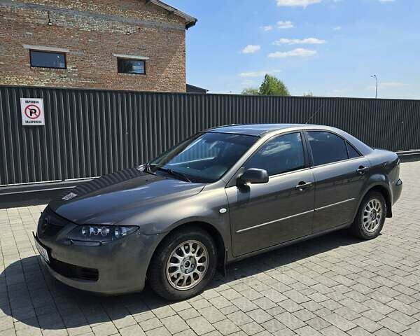 Серый Мазда 6, объемом двигателя 2 л и пробегом 249 тыс. км за 2650 $, фото 1 на Automoto.ua